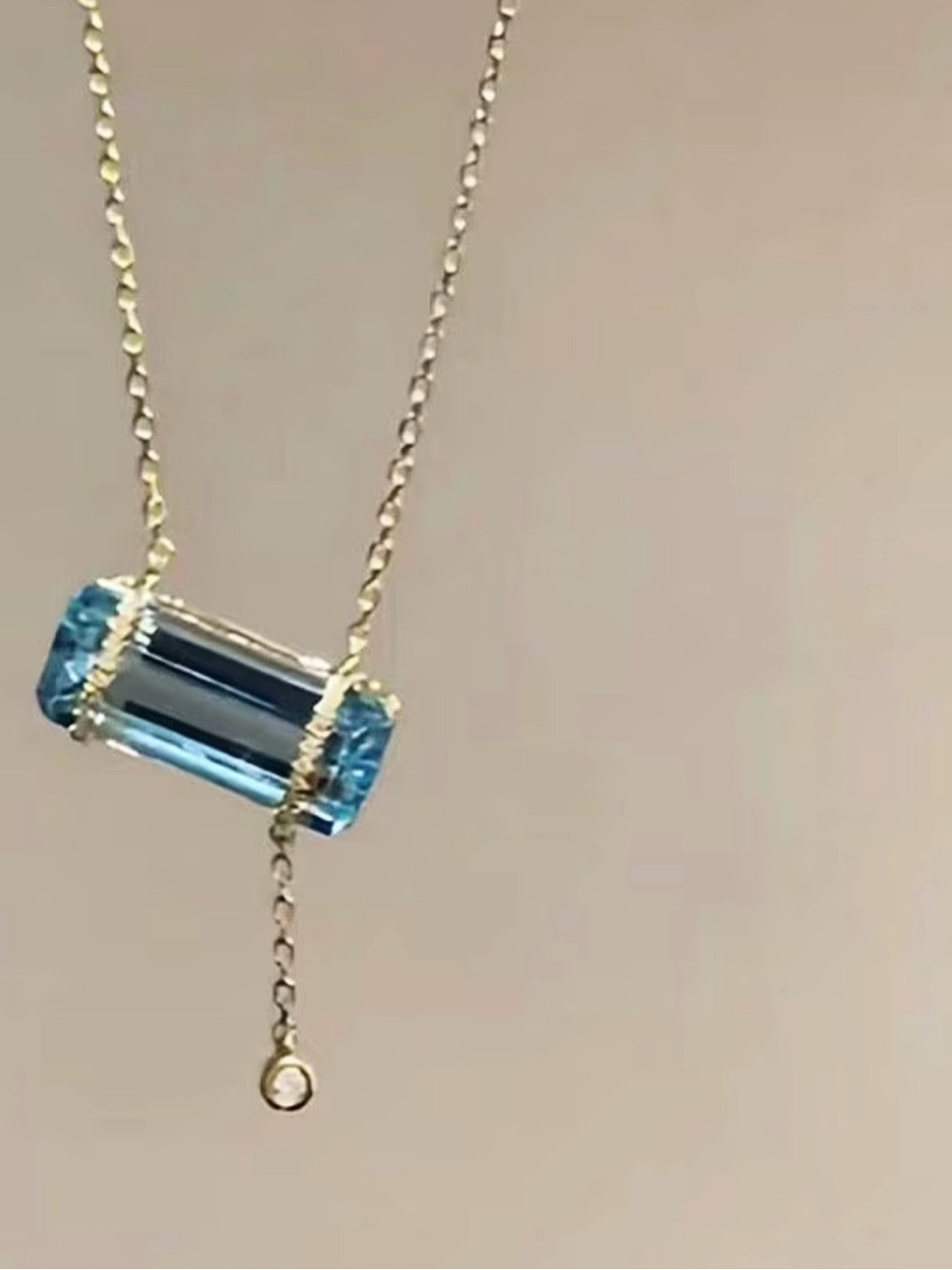 Gold-Tone Necklace with Blue Crystal Drop Pendant